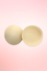 Beige Lightweight removable bra cup inserts for bralettes, bikini tops, and sports bras.