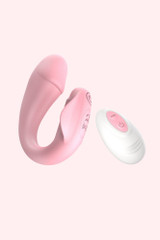 Waterproof Pink Rechargeable Whisper Quiet Wearable Panty Vibrator with Remote Control held on hand for size comparison