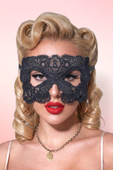 Lace Eye Masquerade mask half face worn by a pin-up girl.