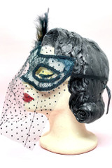 Retro Polkadot Venetian Black Masquerade Mask with Veil on a vintage mannequin head side view