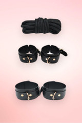 handcuffs and ankle cuffs with bondage rope