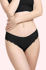 Scallop Raw cut Edge Seamless panty  worn by a model front view 