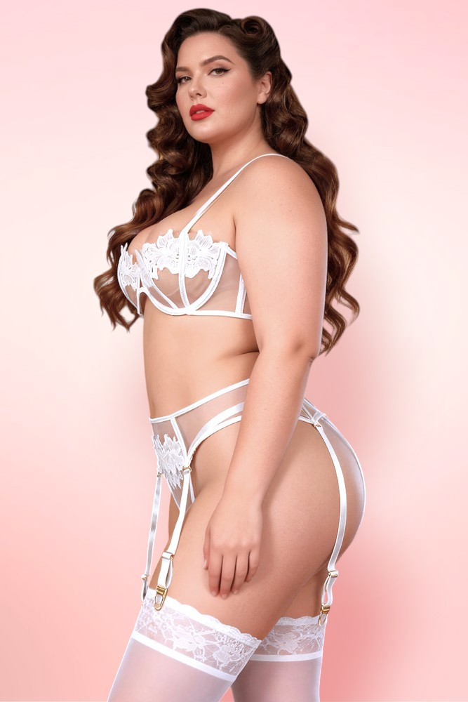 Plus Size model wearing a white bridal lingerie set.