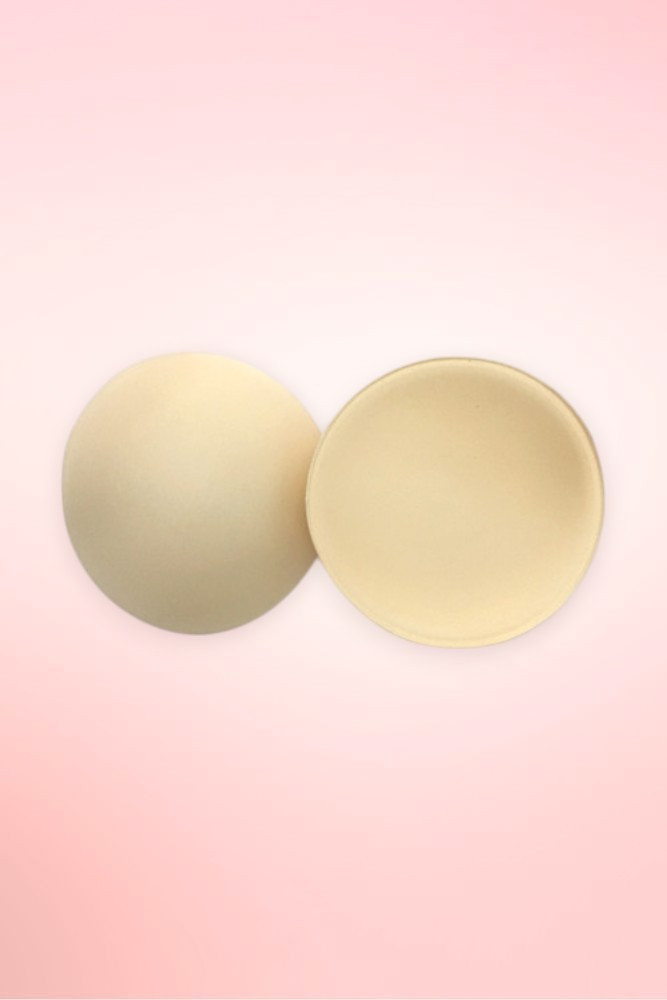 Beige Lightweight removable bra cup inserts for bralettes, bikini tops, and sports bras.