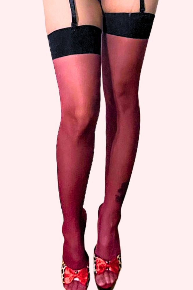Black Wide Band Top Red Sheer Thigh Stockings worn with a garter belt
