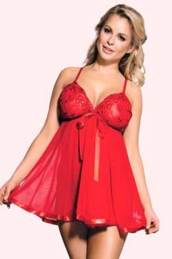 red babydoll dress worn by a model posing 