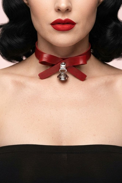 Red bow pleather choker necklace.