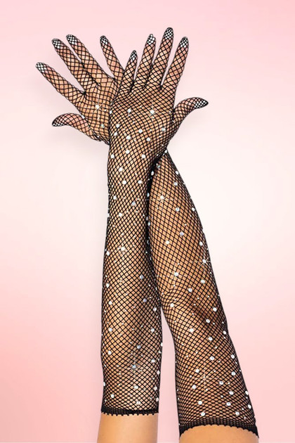 Black sparkle rhinestone fishnet gloves, elbow-length opera gloves with crystal rhinestone detail, both arms posed against pink background.
