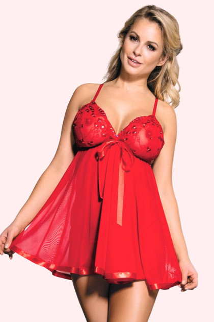 red babydoll dress worn by a model posing 