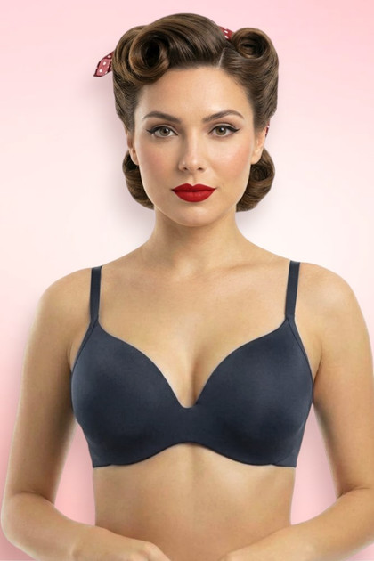 Pin-up girl wearing a black Seamless Tshirt Bra.