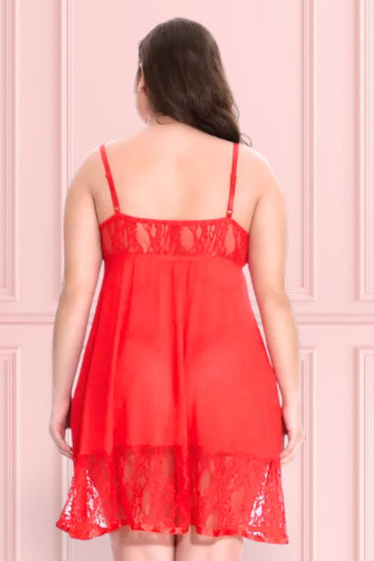 Noelle Plus Size Christmas Babydoll Lingerie in red lace and mesh with white marabou neckline trimmings and pompom ties worn by a curvy model back view