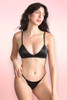 Black satin bralette and thong lingerie set.