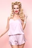 Pin up model wearing Satin Nude Cami shorts set.