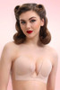 Beige sticky push-up adhesive bra worn on model, strapless and backless with front center clasp creating natural cleavage. 