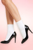 Leg wearing a white crew socks and black high heel.