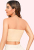beige Tube Bra padded bandeau top  worn by a model back view 