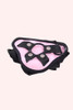 pink strap on harness with straps up close