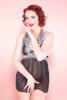 Ada black sheer mesh babydoll nightie on pin-up styled model against pink background.