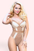 Teagan beige nude lace and satin teddy lingerie and bodysuit worn by a model with one hand playing with her hair