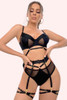 Black lingerie set with model holding her waist
