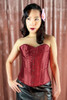 Wine Red Satin Bustier Corset top worn by a woman with pink hair flower