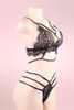 Lingerie Emma Black Lace Bra and Panty Set with eyelash lace and strappy panty actual product picture on a mannequin quarter side view 