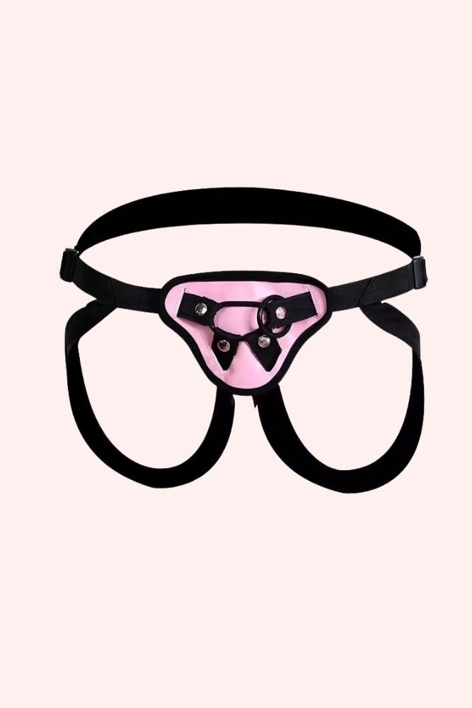 pink strap on harness with straps