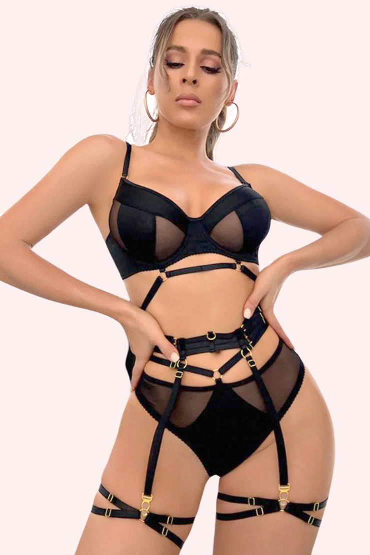 Black lingerie set with model holding her waist