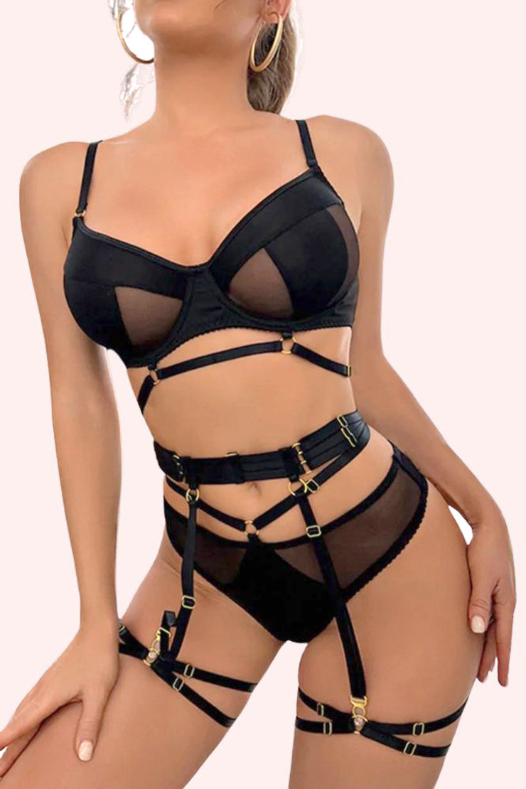 Sexy black lingerie bra and panty set on a model.