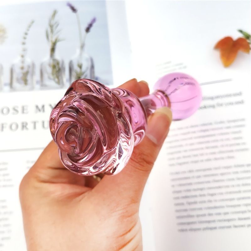 pink rose glass dildo close up image
