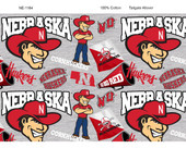 University of Nebraska Cornhuskers Cotton Fabric with Mascot Heather Print and Matching Solid Cotton Fabrics