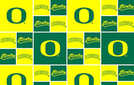 University of Oregon Ducks Cotton Fabric with Geometric Print University of Oregon Ducks Cotton Fabric with Geometric Print