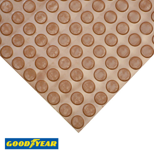 Corner view of Brown Goodyear Coin-Top Rubber Mat