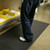 Person next to storage rack, standing on Foot Rest Mats