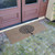angle view of Modern Landscape Contemporary Doormat in front of double doors