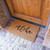 angle view of "Island Greetings" - Aloha (Hello) Welcome Mat  at door