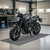 motorcycle on  gray mat in a garage