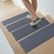 diamond-grip step mat dark gray with person walking on top