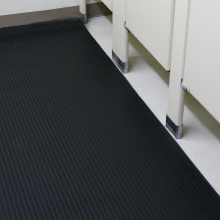 Composite Rib Rubber flooring in a workplace bathroom