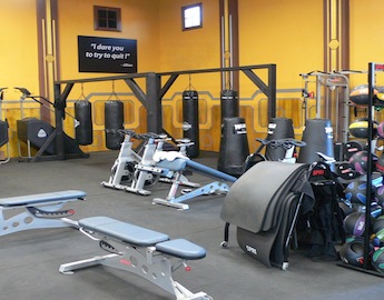 Elephant Bark Rubber Flooring with exercise equipment on top of it in a gym