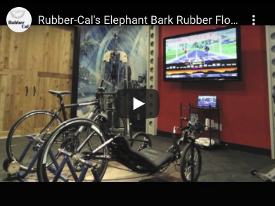 Elephant Bark Home Gym Floor Exercise Bikes in front of tv on Elephant bark floor