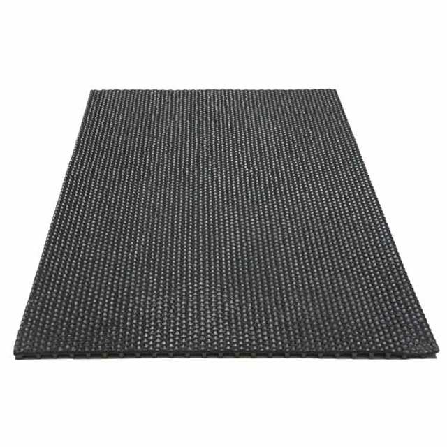 Dura-Scraper Rubber Doormat outside of glass door