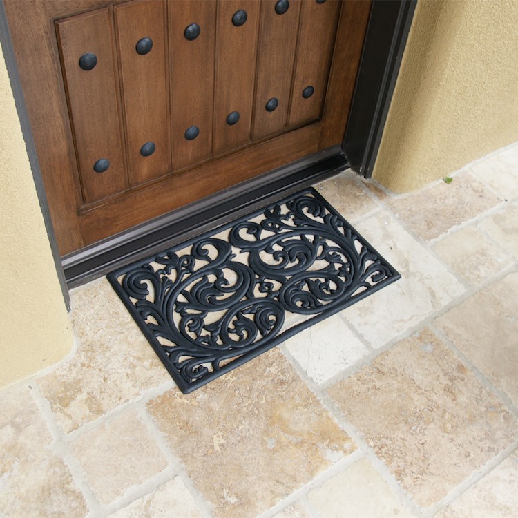 Genoa pattern rubber doormat on tile in front of door