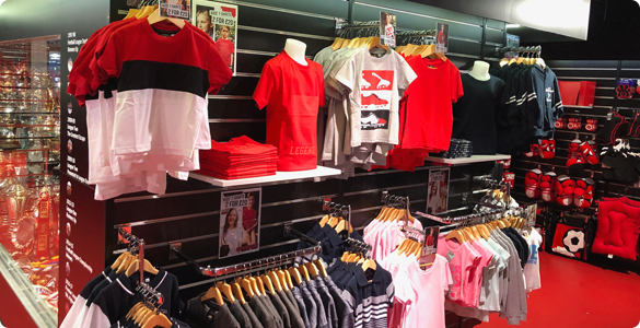 Children's clothing on display in a sports shop