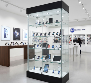  Wall mounted twin slot shelving, with boxes, and magazines at the top 