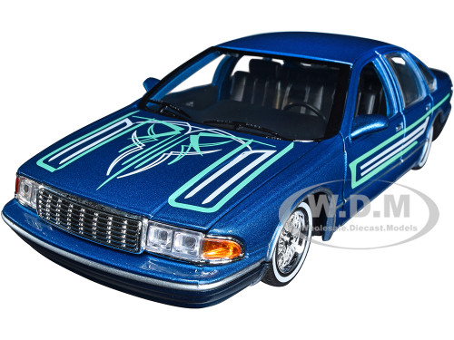 1993 Chevrolet Caprice Lowrider Blue Metallic Graphics Get Low Series 1/24 Diecast Model Car Motormax 79022