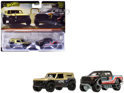 Ford Bronco R Gold Metallic and Black and 2017 Ford F 150 Raptor Pickup Truck #17 Black with Stripes Car Culture Set of 2 Cars Diecast Model Cars Hot Wheels HRR77-956M