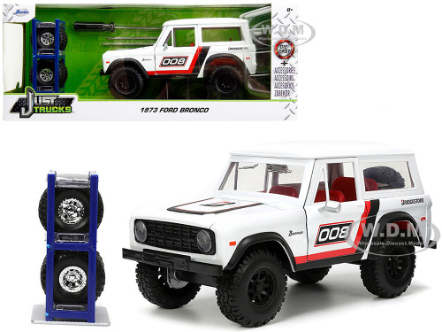 1973 Ford Bronco #008 White with Red and Black Stripes and Red Interior with Extra Wheels Just Trucks Series 1/24 Diecast Model Car Jada 34181