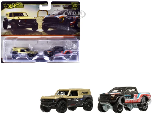 Ford Bronco R Gold Metallic and Black and 2017 Ford F 150 Raptor Pickup Truck #17 Black with Stripes Car Culture Set of 2 Cars Diecast Model Cars Hot Wheels HRR77-956M