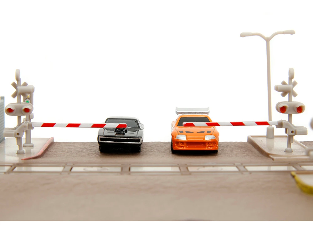 Fast & Furious Final Race Diorama with Toyota Supra Orange and